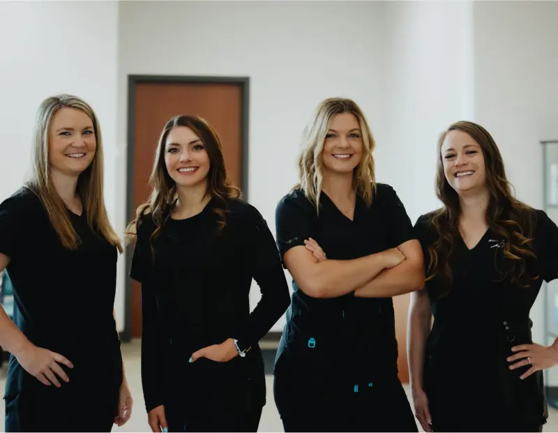 Smiling members of the Hilltop Family Dental team